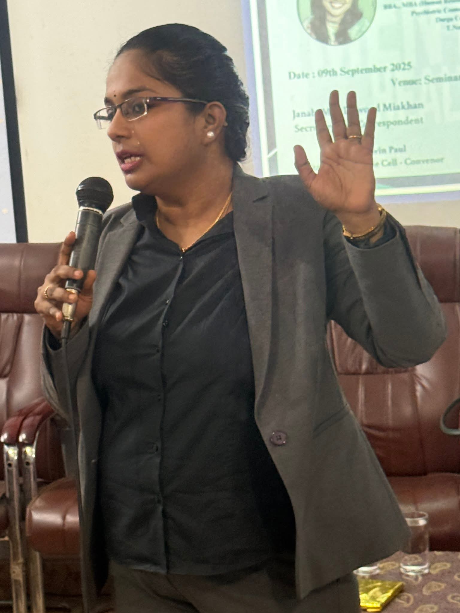 D. Durga speaking at training event